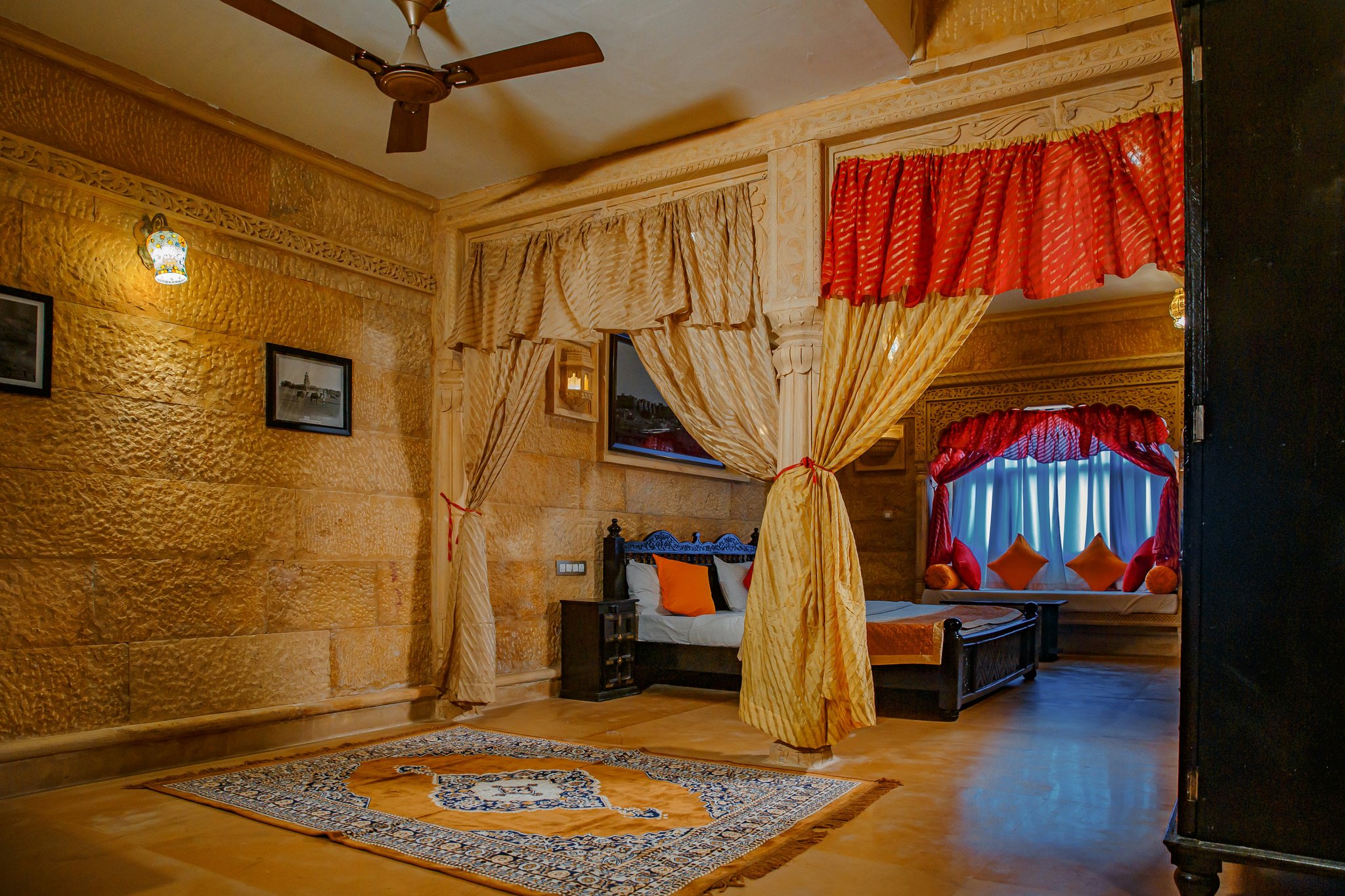 A trainer rewarding a dog with a treat during an obstacle course session.